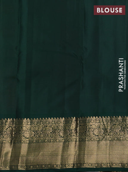 Pure kanchipuram silk saree dual shade of pinkish orange and green with rudraksha zari woven buttas and long zari woven korvai border