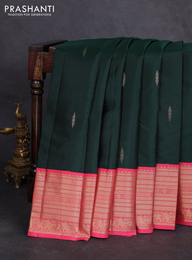 Pure kanchipuram silk saree bottle green and peach pink with zari woven buttas and long zari woven korvai border