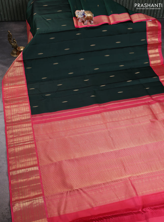 Pure kanchipuram silk saree bottle green and peach pink with zari woven buttas and long zari woven korvai border