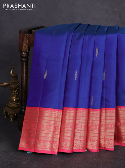 Pure kanchipuram silk saree blue and peach pink with zari woven buttas and zari woven korvai border