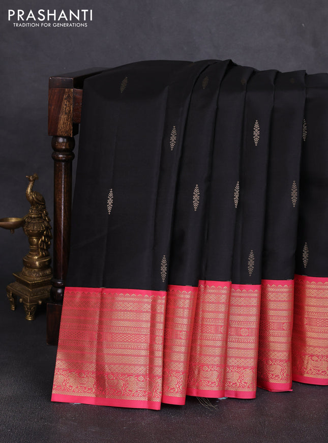 Pure kanchipuram silk saree black and peach pink with zari woven buttas and long zari woven korvai border