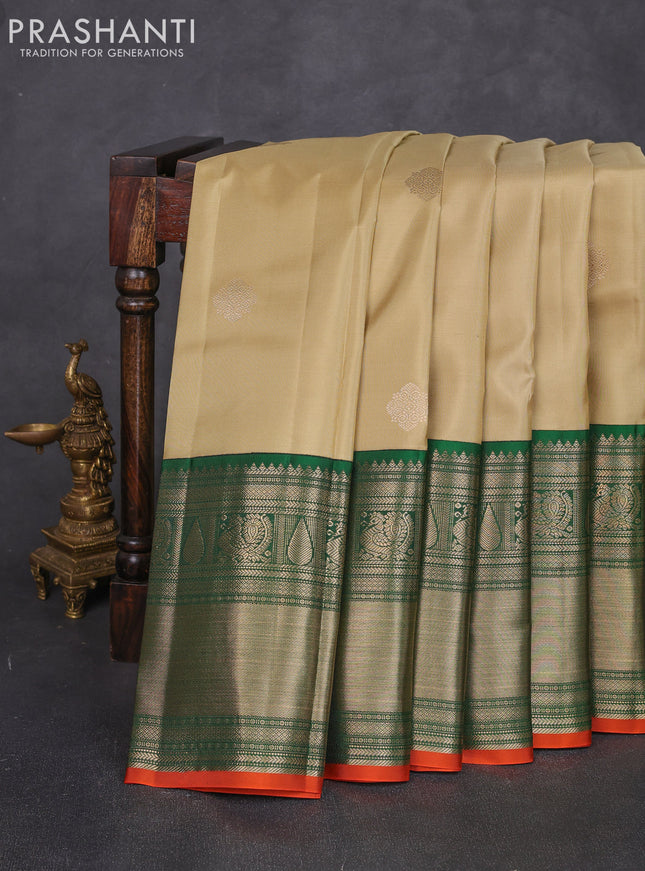 Pure kanchipuram silk saree pista green and green with zari woven buttas and long zari woven korvai border