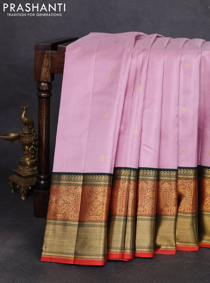 Pure kanchipuram silk saree pastel pink and bottle green with zari woven buttas and long zari woven korvai border