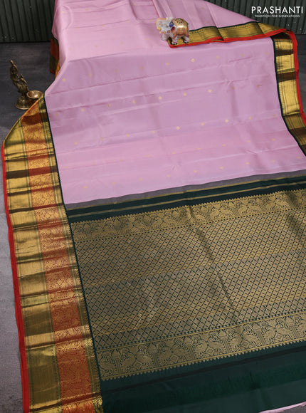 Pure kanchipuram silk saree pastel pink and bottle green with zari woven buttas and long zari woven korvai border