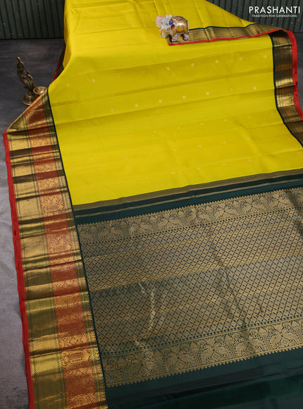 Pure kanchipuram silk saree lime yellow and bottle green with zari woven buttas and long zari woven korvai border