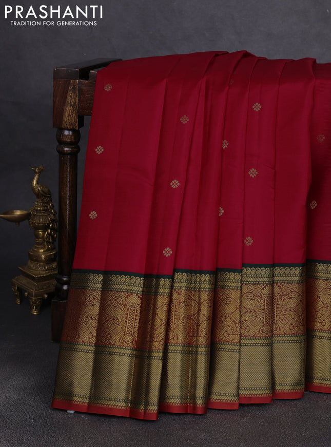 Pure kanchipuram silk saree red and bottle green with zari woven buttas and long zari woven korvai border