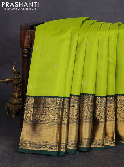 Pure kanchipuram silk saree light green and bottle green with zari woven buttas and long zari woven korvai border