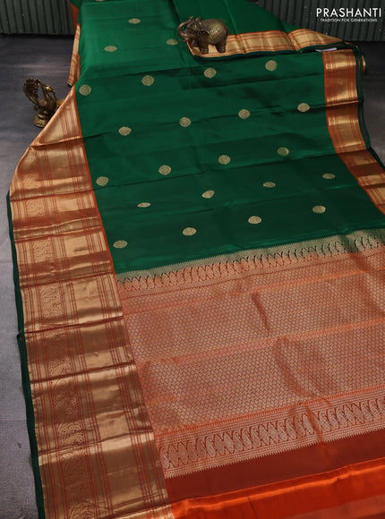 Pure kanchipuram silk saree green and orange with zari woven buttas and long zari woven korvai border