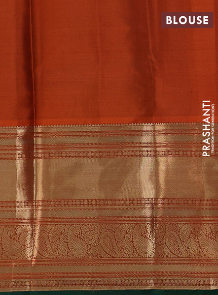 Pure kanchipuram silk saree green and orange with zari woven buttas and long zari woven korvai border