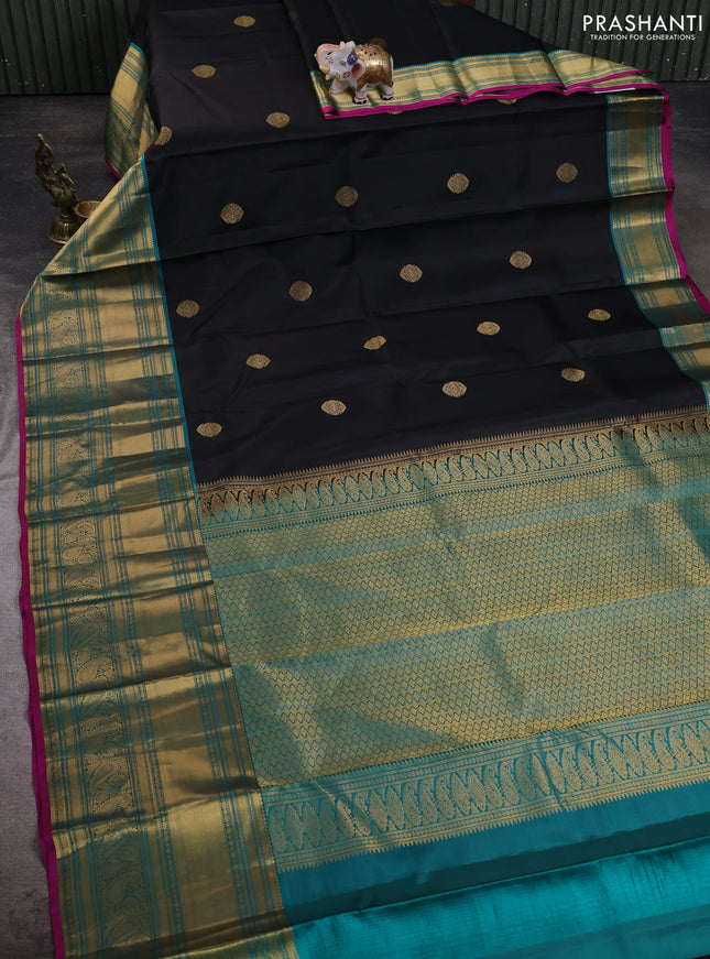 Pure kanchipuram silk saree black and teal blue with zari woven buttas and long zari woven korvai border