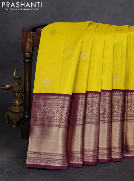 Pure kanchipuram silk saree lime yellow and wine shade with zari woven buttas and long zari woven korvai border