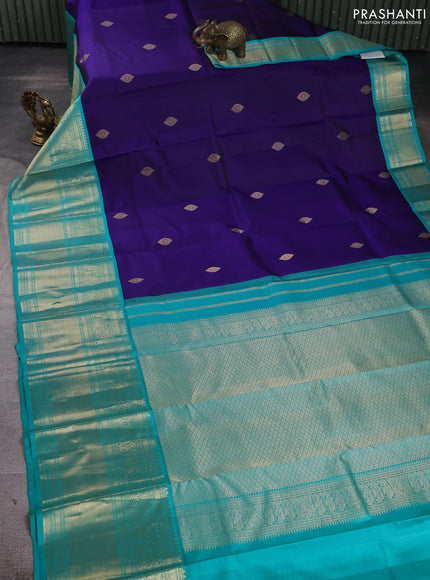 Pure kanchipuram silk saree dark blue and teal blue with zari woven buttas and long zari woven korvai border