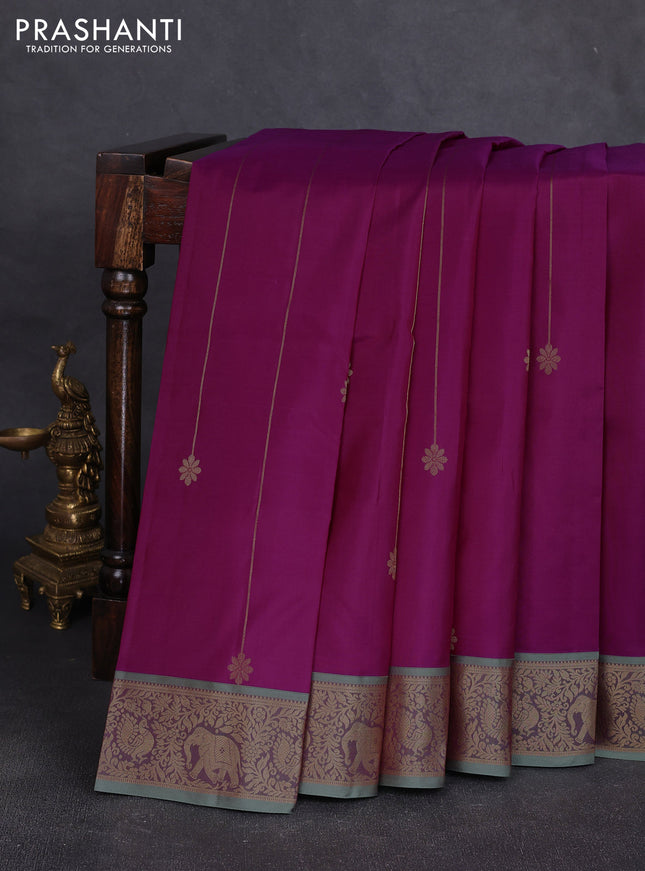 Pure kanchipuram silk saree magenat pink and pastel green with allover zari strips & buttas and zari woven korvai border