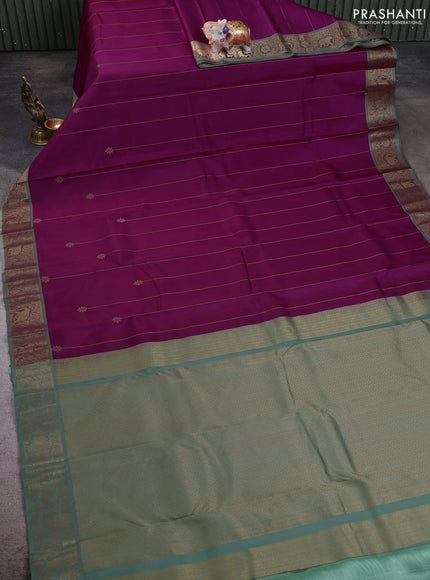 Pure kanchipuram silk saree magenat pink and pastel green with allover zari strips & buttas and zari woven korvai border