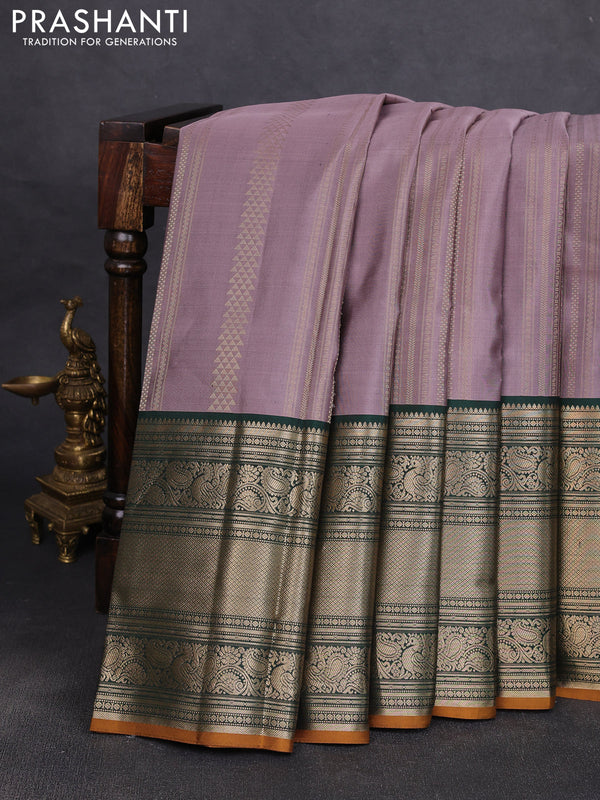 Pure kanchipuram silk saree rosy brown and bottle green with allover zari stripe pattern and long zari woven korvai border