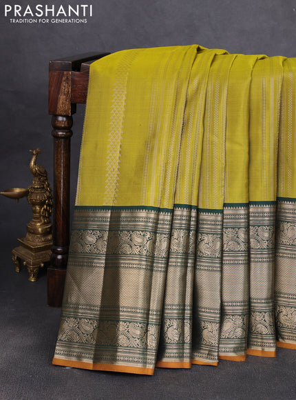 Pure kanchipuram silk saree mehendi green and bottle green with allover zari stripe pattern and long zari woven korvai border