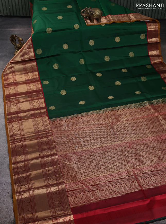 Pure kanchipuram silk saree green and maroon with rudhraksha zari woven buttas and long zari woven korvai border