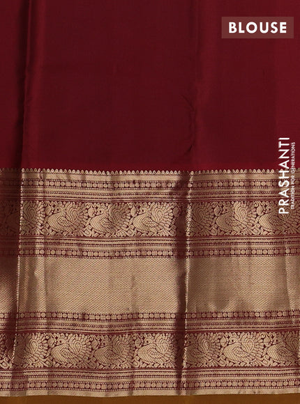 Pure kanchipuram silk saree green and maroon with rudhraksha zari woven buttas and long zari woven korvai border
