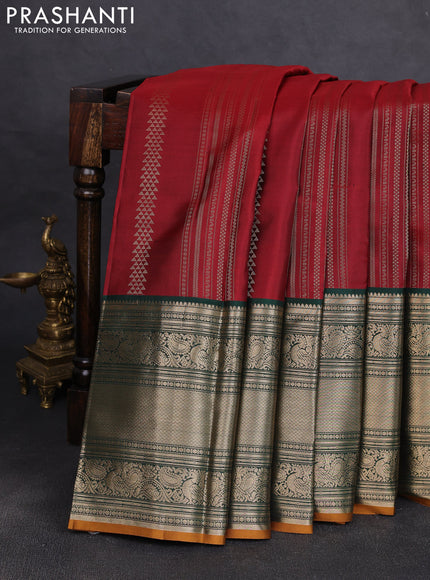 Pure kanchipuram silk saree maroon and bottle green with allover zari stripe pattern and long zari woven korvai border
