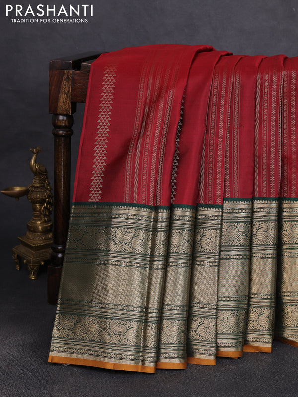 Pure kanchipuram silk saree maroon and bottle green with allover zari stripe pattern and long zari woven korvai border