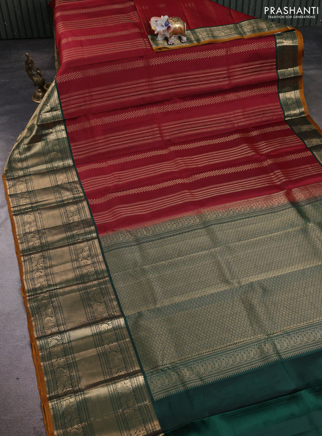 Pure kanchipuram silk saree maroon and bottle green with allover zari stripe pattern and long zari woven korvai border