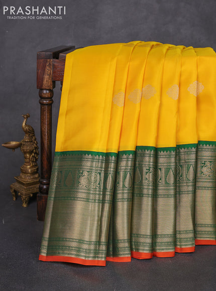 Pure kanchipuram silk saree yellow and green with zari woven buttas and long zari woven korvai border
