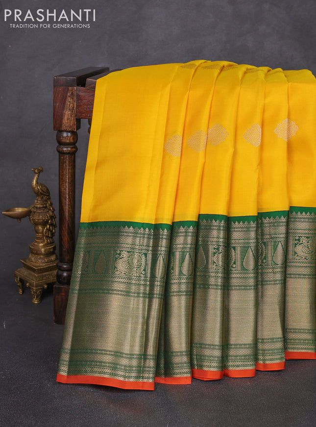 Pure kanchipuram silk saree yellow and green with zari woven buttas and long zari woven korvai border