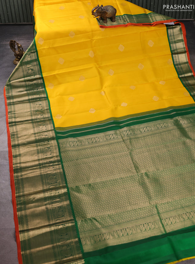 Pure kanchipuram silk saree yellow and green with zari woven buttas and long zari woven korvai border