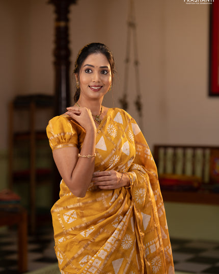 Semi chanderi saree yellow and off white with allover zari checks & batik prints and batik printed border