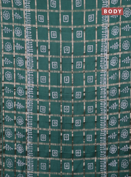 Semi chanderi saree green and off white with allover zari checks & batik prints and batik printed border