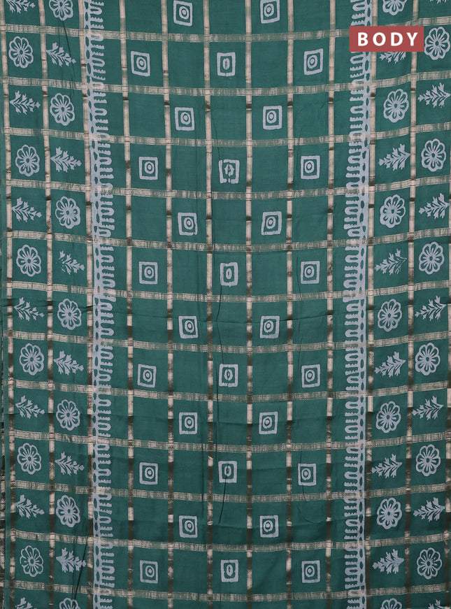 Semi chanderi saree green and off white with allover zari checks & batik prints and batik printed border