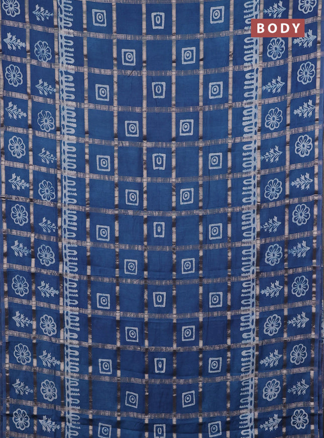 Semi chanderi saree teal blue and off white with allover zari checks & batik prints and batik printed border