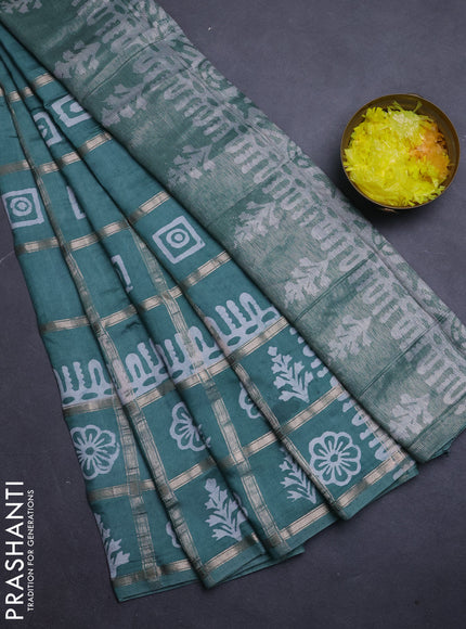 Semi chanderi saree mild teal green and off white with allover zari checks & batik prints and batik printed border