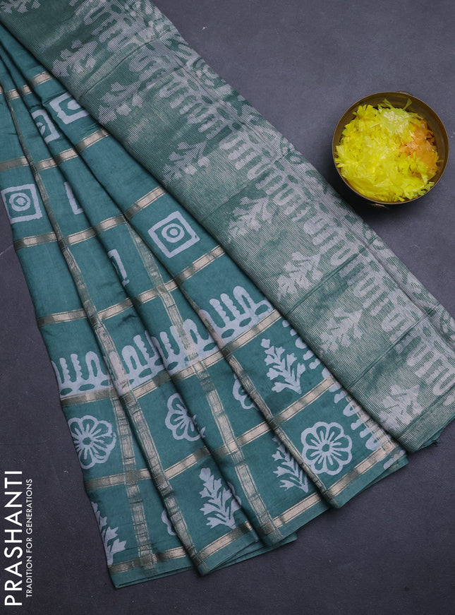 Semi chanderi saree mild teal green and off white with allover zari checks & batik prints and batik printed border