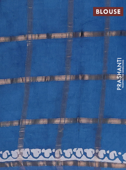 Semi chanderi saree teal blue with allover zari checks & batik prints in borderless style