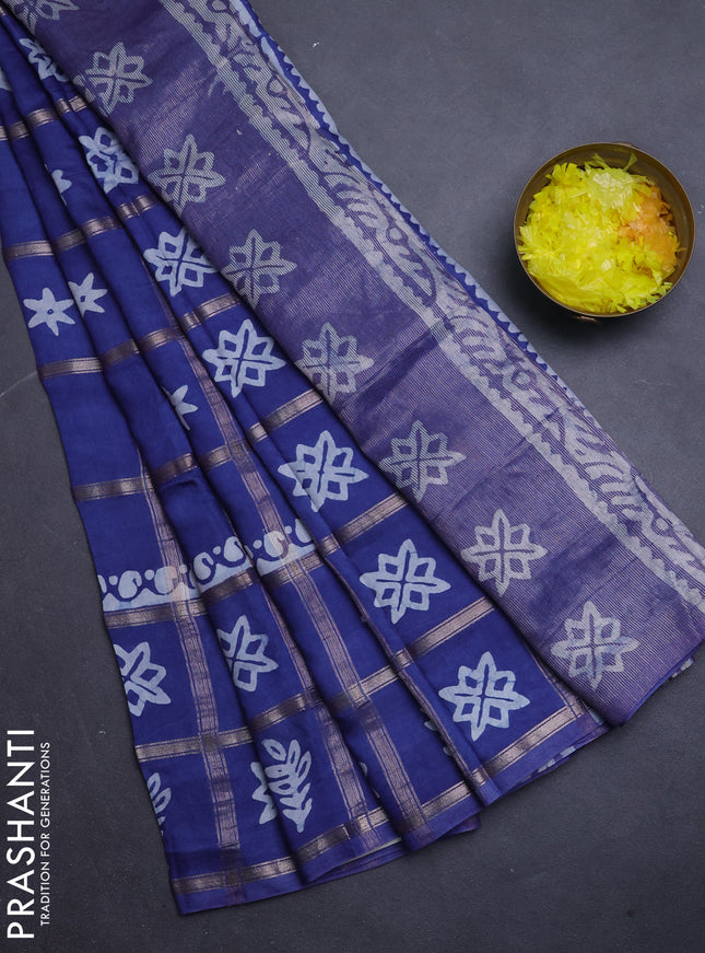 Semi chanderi saree blue with allover zari checks & batik prints in borderless style