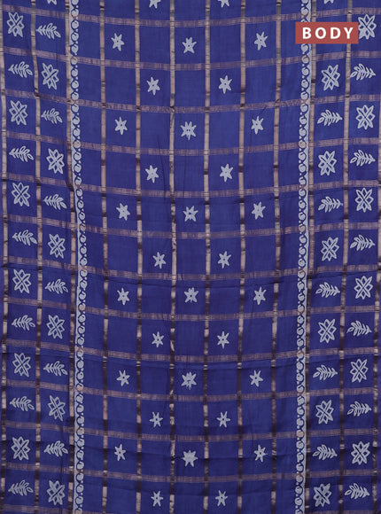 Semi chanderi saree blue with allover zari checks & batik prints in borderless style
