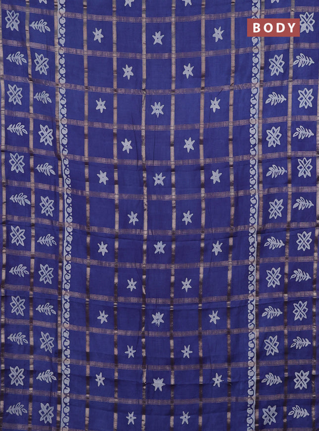 Semi chanderi saree blue with allover zari checks & batik prints in borderless style