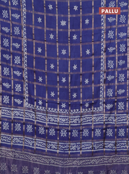 Semi chanderi saree blue with allover zari checks & batik prints in borderless style