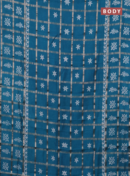 Semi chanderi saree teal green with allover zari checks & batik prints in borderless style