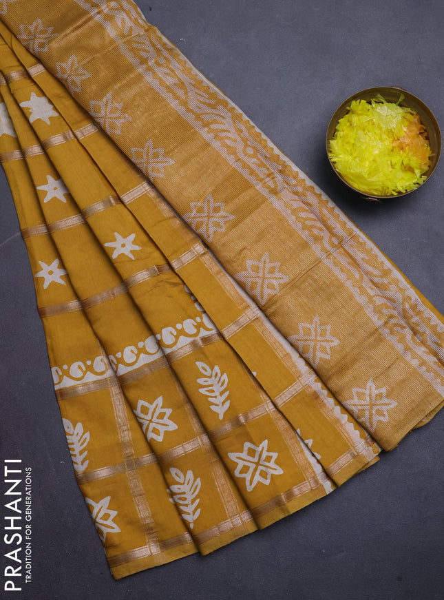 Semi chanderi saree mustard yellow with allover zari checks & batik prints in borderless style