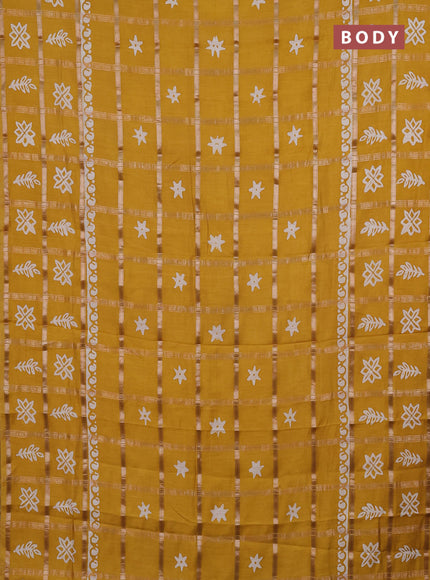 Semi chanderi saree mustard yellow with allover zari checks & batik prints in borderless style