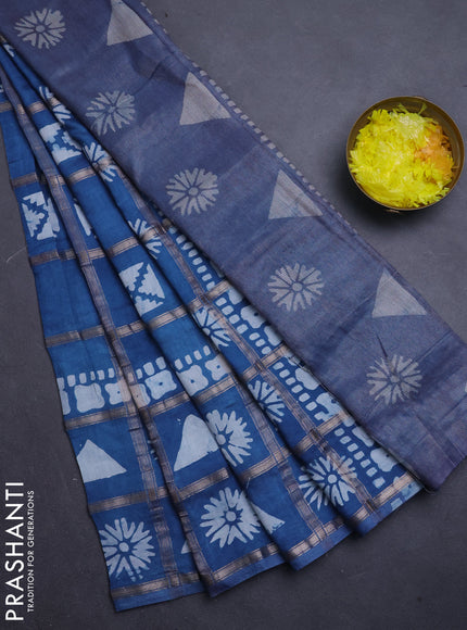 Semi chanderi saree teal blue with allover zari checks & batik prints in borderless style