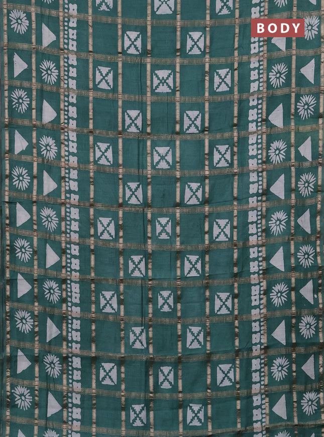 Semi chanderi saree green with allover zari checks & batik prints in borderless style