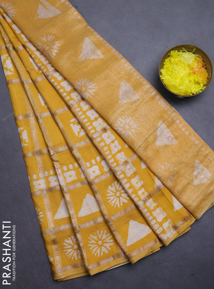 Semi chanderi saree mustard yellow with allover zari checks & batik prints in borderless style