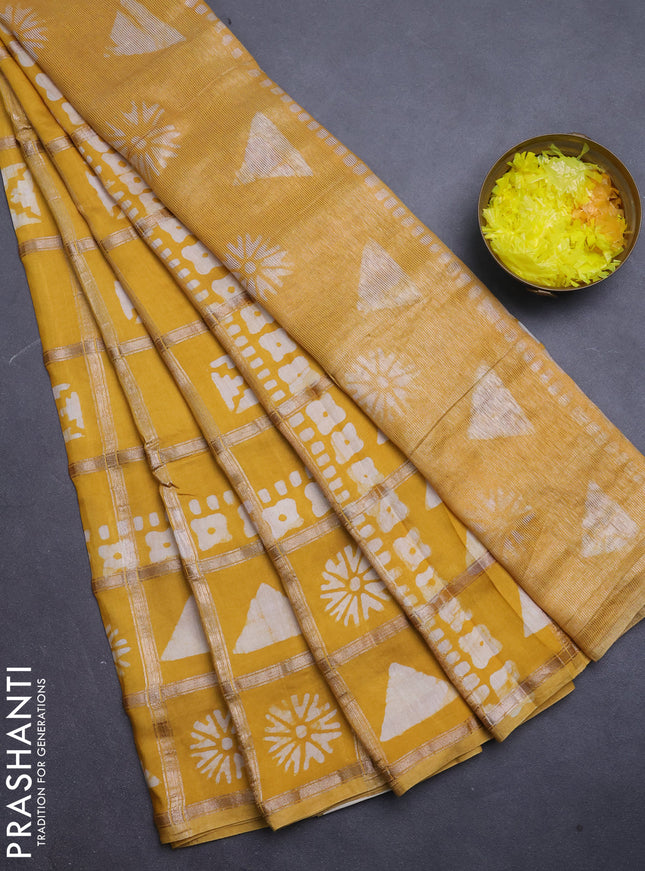 Semi chanderi saree mustard yellow with allover zari checks & batik prints in borderless style