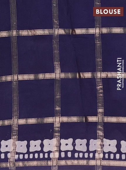 Semi chanderi saree navy blue with allover zari checks & batik prints in borderless style