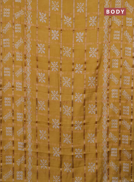 Semi chanderi saree mustard with allover zari checks & batik prints in borderless style