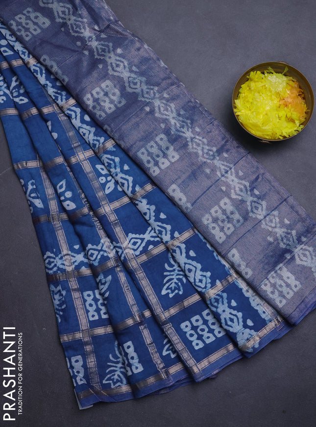 Semi chanderi saree peacock blue with allover zari checks & batik prints in borderless style