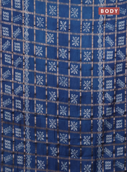 Semi chanderi saree peacock blue with allover zari checks & batik prints in borderless style